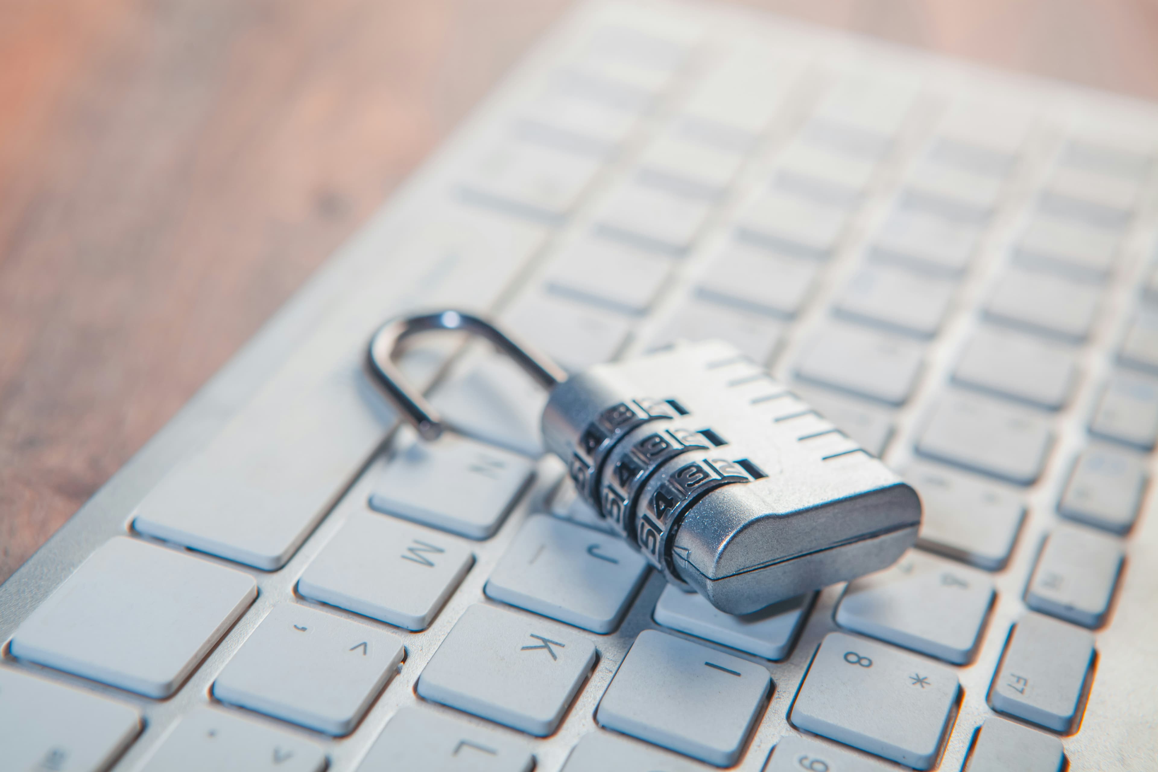 A combination lock on a laptop keyboard